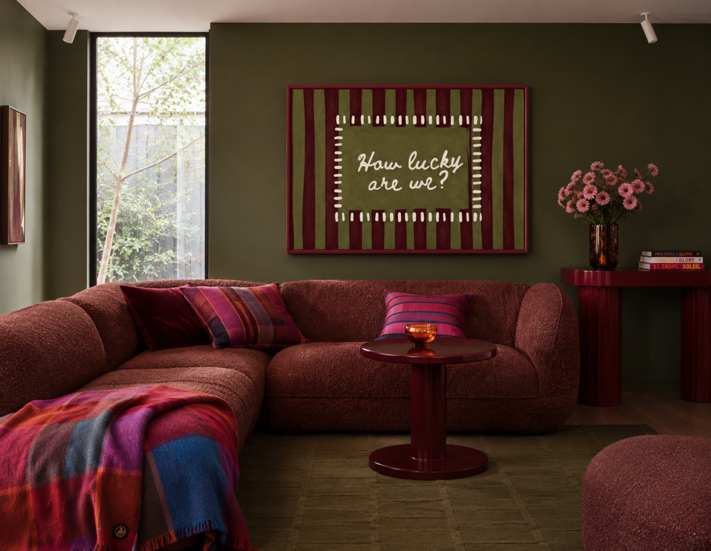 hand drawn Playful typography print with the phrase "How Lucky Are We?" on a khaki and ruby burgundy striped background. This is a hand drawn trendy typography wall art print ideal for bedrooms, dorm room decor, gallery walls and playful interiors.