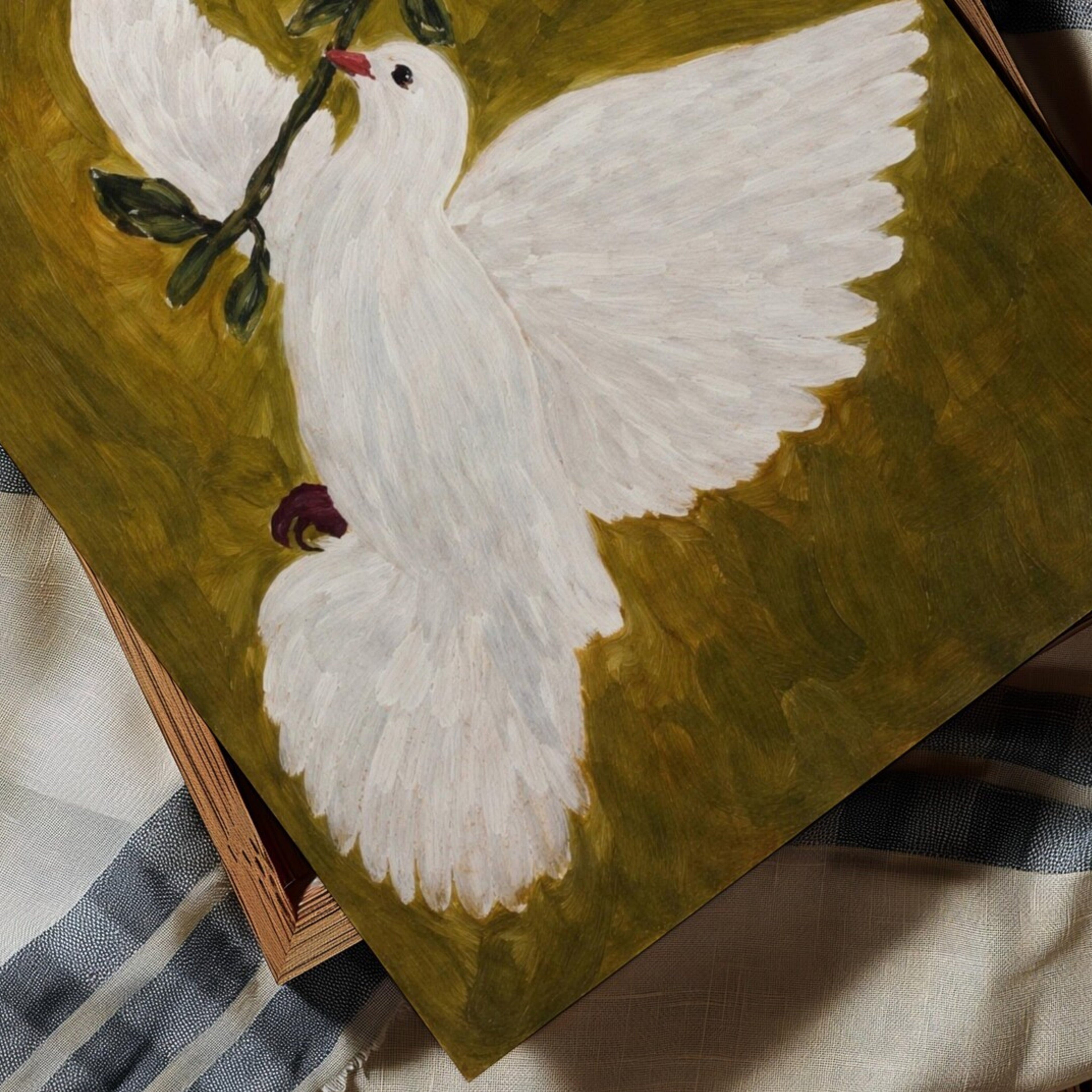 White dove with outstretched wings on a green background