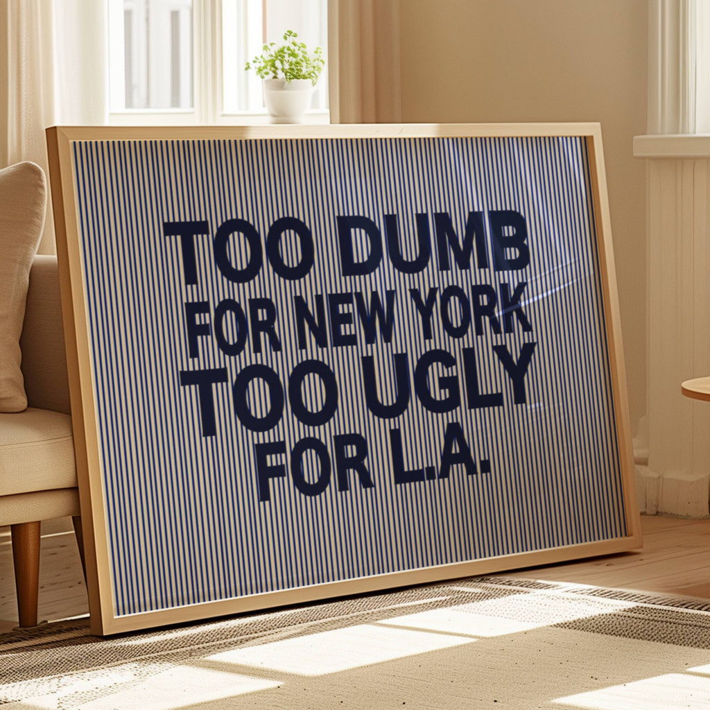 hand drawn Playful Funny typography print with the phrase "TOO DUMB FOR NY, TOO UGLY FOR LA" in a retro striped navy blue canva. This is a trendy funny typography wall art print ideal for above bed, bedrooms, dorm room decor, living rooms and kitchens, gallery walls and playful interiors. The perfect Cool Girl Apartment decor