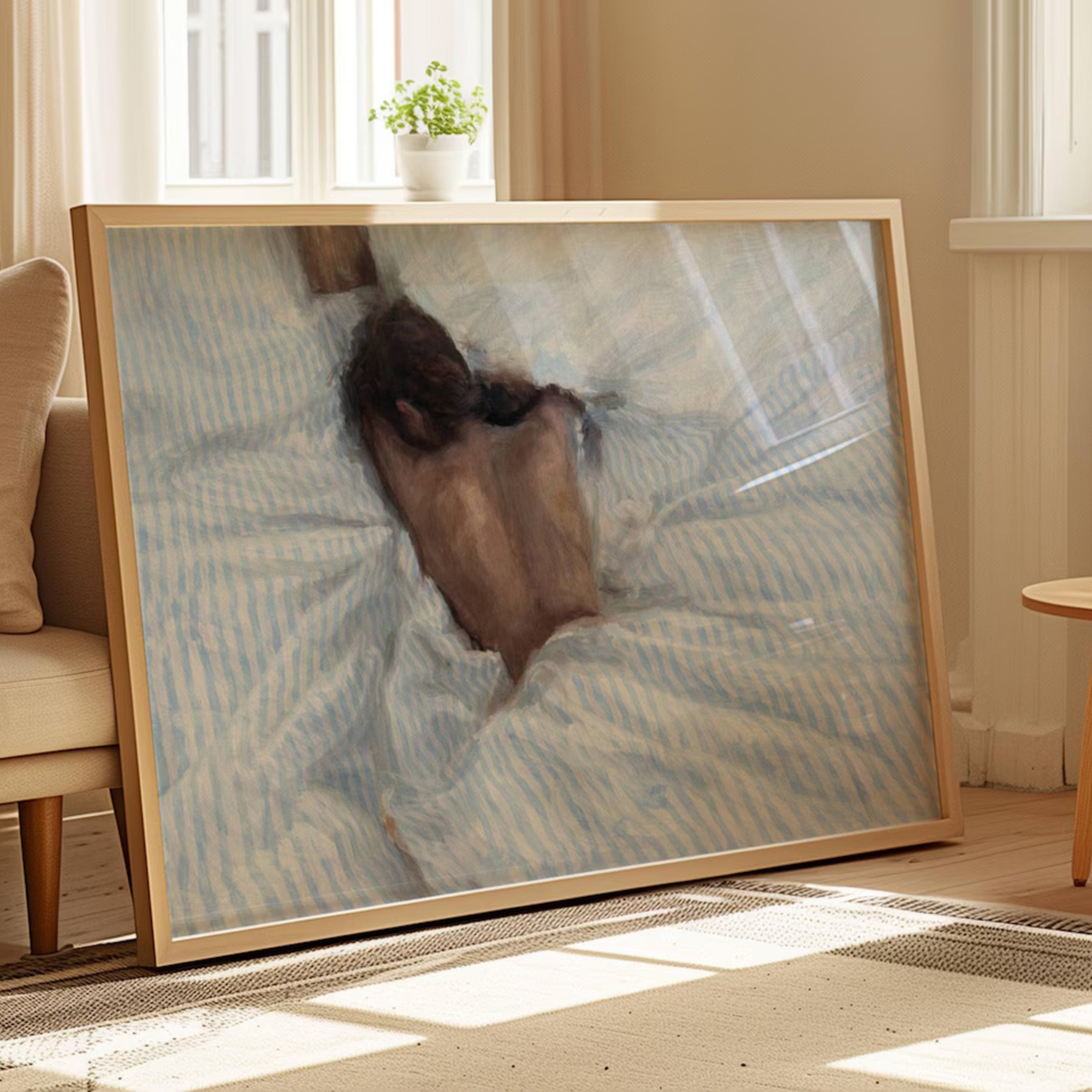 the art of staying is a hand painted wall art print of a sleeping womam in striped bedding, in light blue and butter yellow tones, inspired by slow mornings and nostalgic interiors, symbolizing quiet luxury and unhurried mornings. Horizontal above bed oil painting wall art print . sunday morning aesthetic intimate wall art