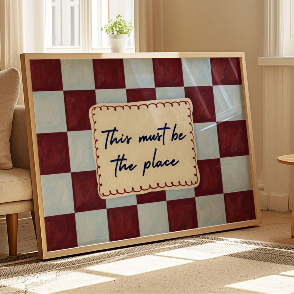 hand drawn Playful typography print with the phrase "this must be the place" in a retro checkerboard blue and ruby burgundy, on textured oil painting canva. This is a hand drawn trendy typography ideal for above bed, bedrooms, dorm room decor, living rooms and kitchens, gallery walls and playful interiors.