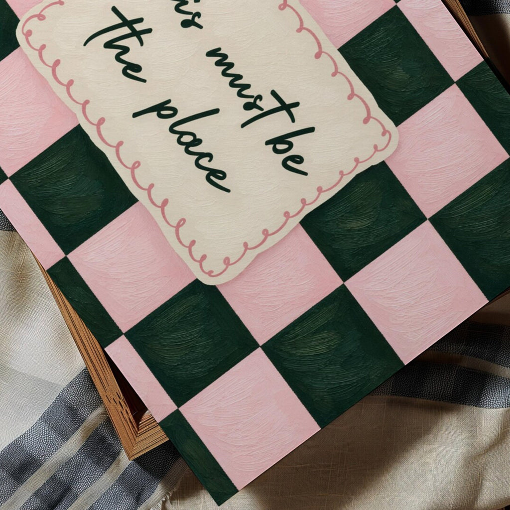 hand drawn Playful typography print with the phrase "this must be the place" in a retro checkerboard pink and green, on textured oil painting canva. This is a hand drawn trendy typography ideal for above bed, bedrooms, dorm room decor, living rooms and kitchens, gallery walls and playful interiors.