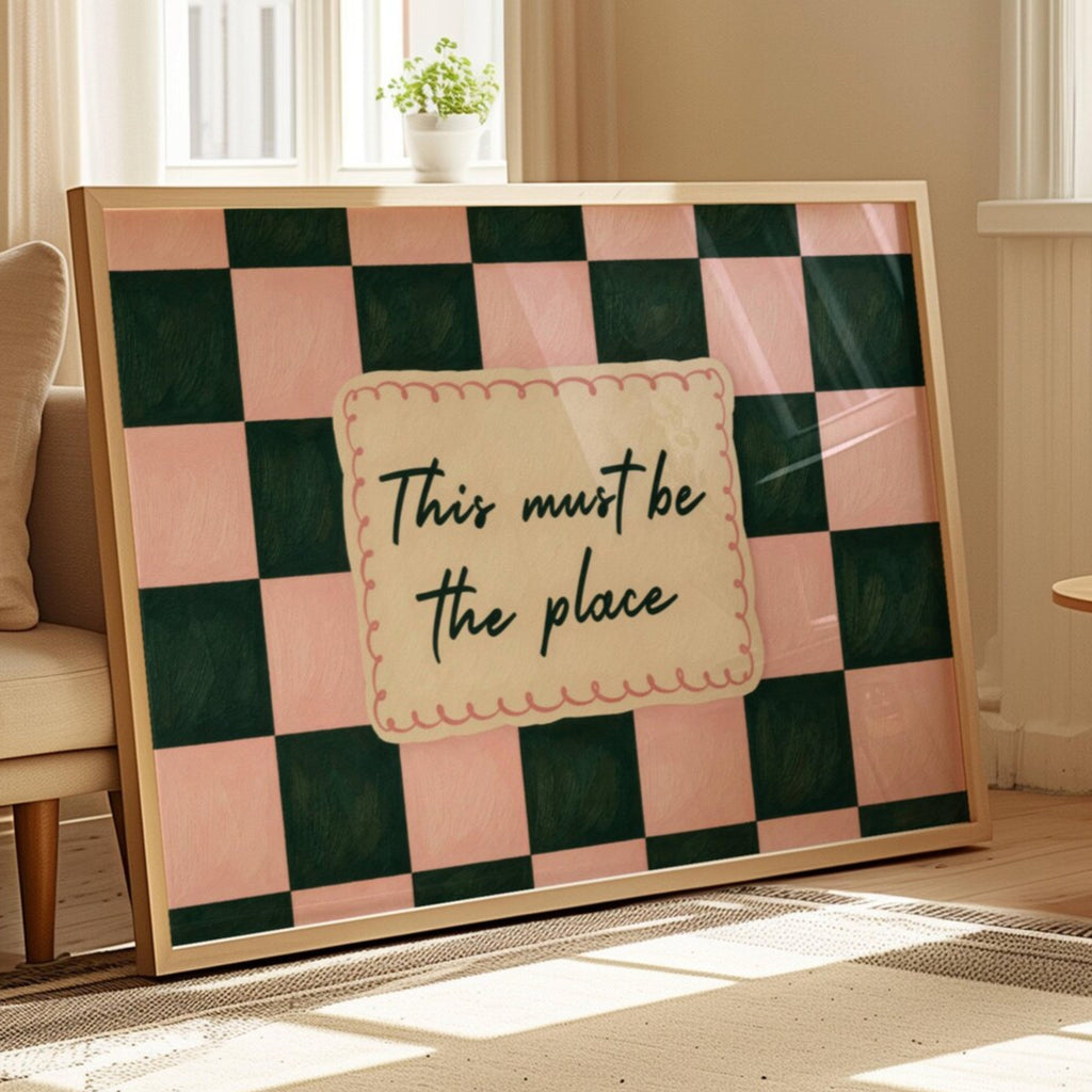 hand drawn Playful typography print with the phrase "this must be the place" in a retro checkerboard pink and green, on textured oil painting canva. This is a hand drawn trendy typography ideal for above bed, bedrooms, dorm room decor, living rooms and kitchens, gallery walls and playful interiors.