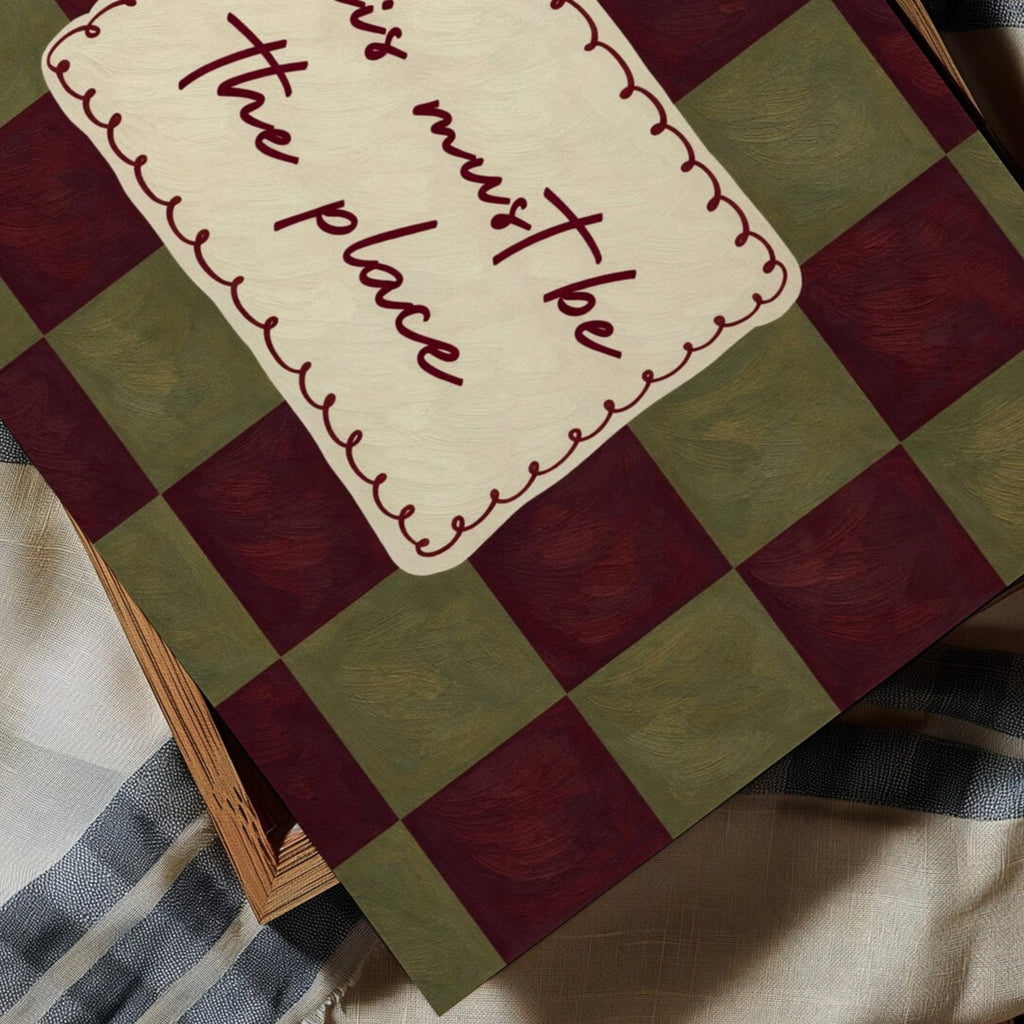 hand drawn Playful typography print with the phrase "this must be the place" in a retro checkerboard khaki and ruby burgundy, on textured oil painting canva. This is a hand drawn trendy typography ideal for above bed, bedrooms, dorm room decor, living rooms and kitchens, gallery walls and playful interiors.