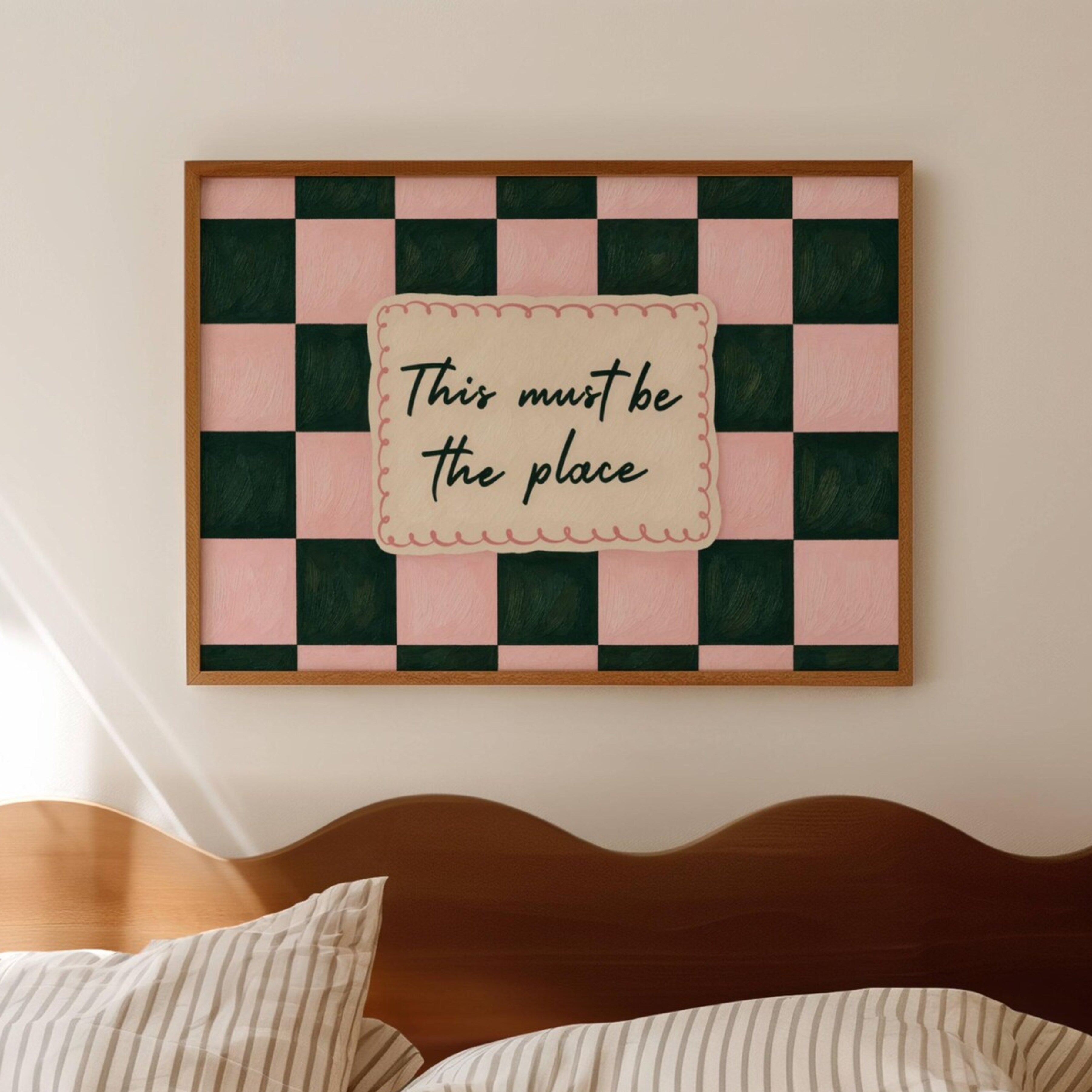 hand drawn Playful typography print with the phrase "this must be the place" in a retro checkerboard pink and green, on textured oil painting canva. This is a hand drawn trendy typography ideal for above bed, bedrooms, dorm room decor, living rooms and kitchens, gallery walls and playful interiors.