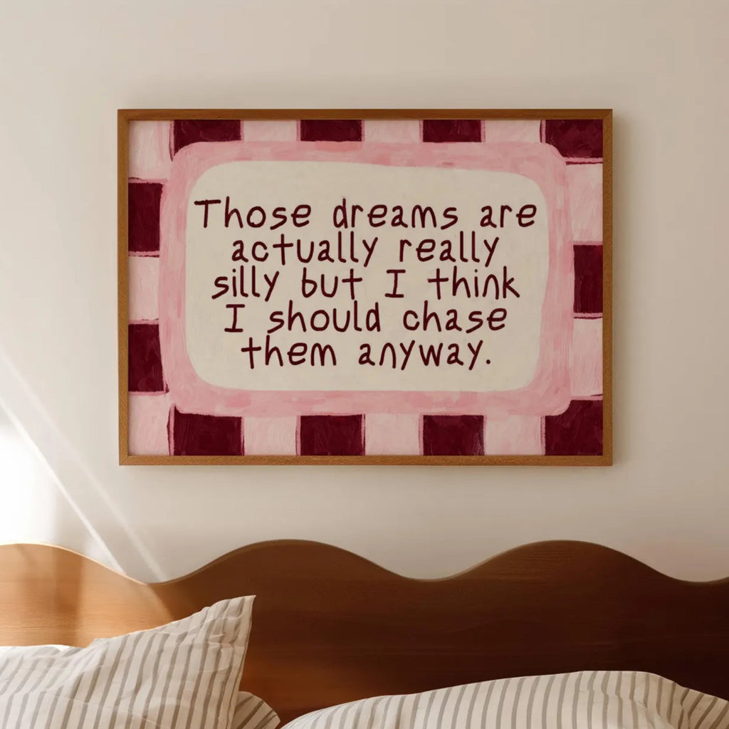 hand drawn Playful motivational bedroom typography print with the phrase "those dreams areactually really silly but i think i should chase them anyway" in pink and ruby burgundy, on textured oil painting canva. This is a hand drawn trendy typography wall art print ideal for above bed, bedrooms, dorm room decor, living rooms and kitchens, gallery walls and playful interiors.