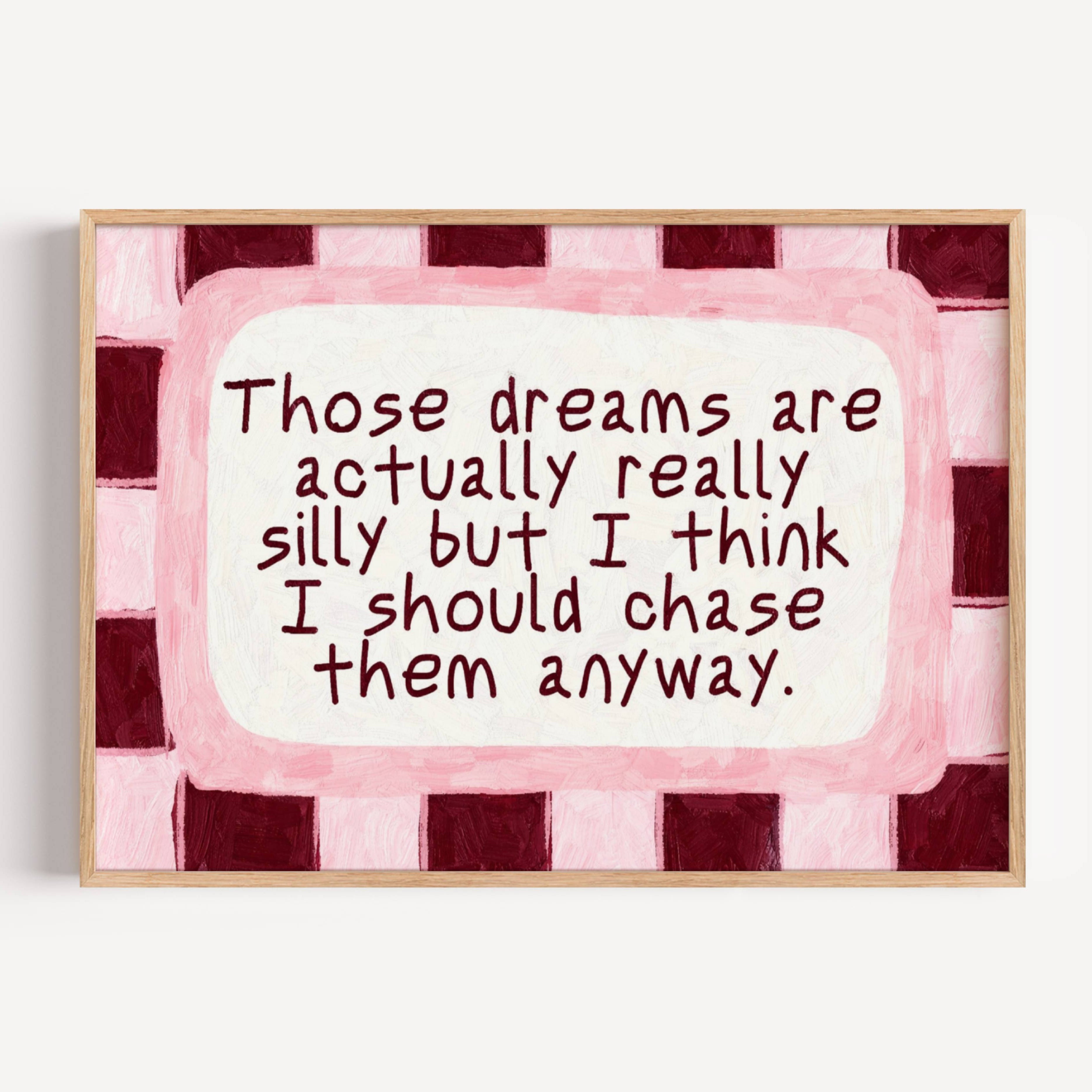 hand drawn Playful motivational bedroom typography print with the phrase "those dreams areactually really silly but i think i should chase them anyway" in pink and ruby burgundy, on textured oil painting canva. This is a hand drawn trendy typography wall art print ideal for above bed, bedrooms, dorm room decor, living rooms and kitchens, gallery walls and playful interiors.