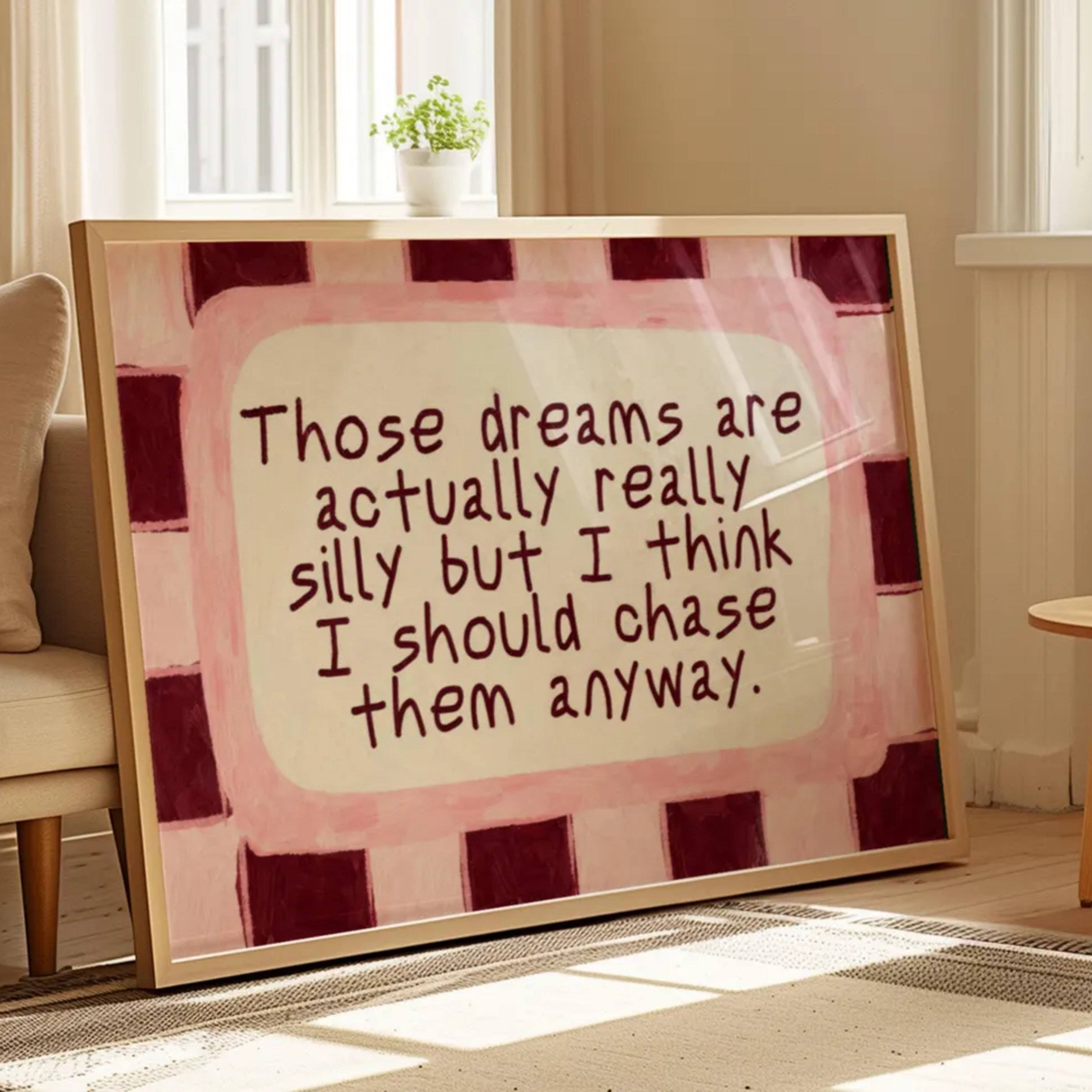 hand drawn Playful motivational bedroom typography print with the phrase "those dreams areactually really silly but i think i should chase them anyway" in pink and ruby burgundy, on textured oil painting canva. This is a hand drawn trendy typography wall art print ideal for above bed, bedrooms, dorm room decor, living rooms and kitchens, gallery walls and playful interiors.