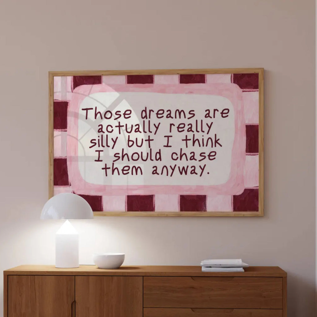hand drawn Playful motivational bedroom typography print with the phrase "those dreams areactually really silly but i think i should chase them anyway" in pink and ruby burgundy, on textured oil painting canva. This is a hand drawn trendy typography wall art print ideal for above bed, bedrooms, dorm room decor, living rooms and kitchens, gallery walls and playful interiors.