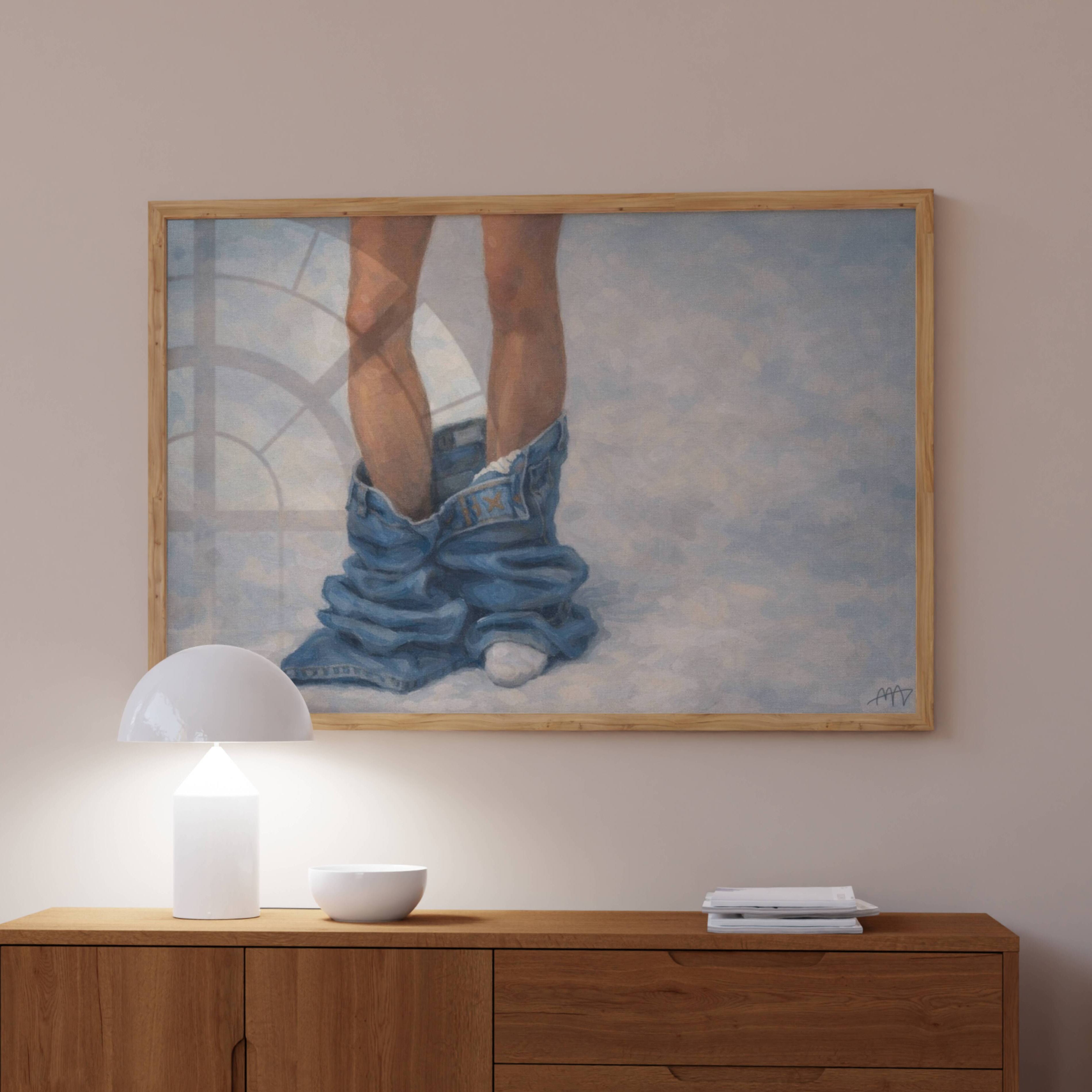 undone is a hand painted Contemporary and figurative feminine wall art print depicting jeans pooled around a figure's legs, exloring femininity, intimacy and quiet daily rituals, against a light blue background with expressive painterly texture. Minimalist Mid century modern oil painting in cinematic nostalgia composition.