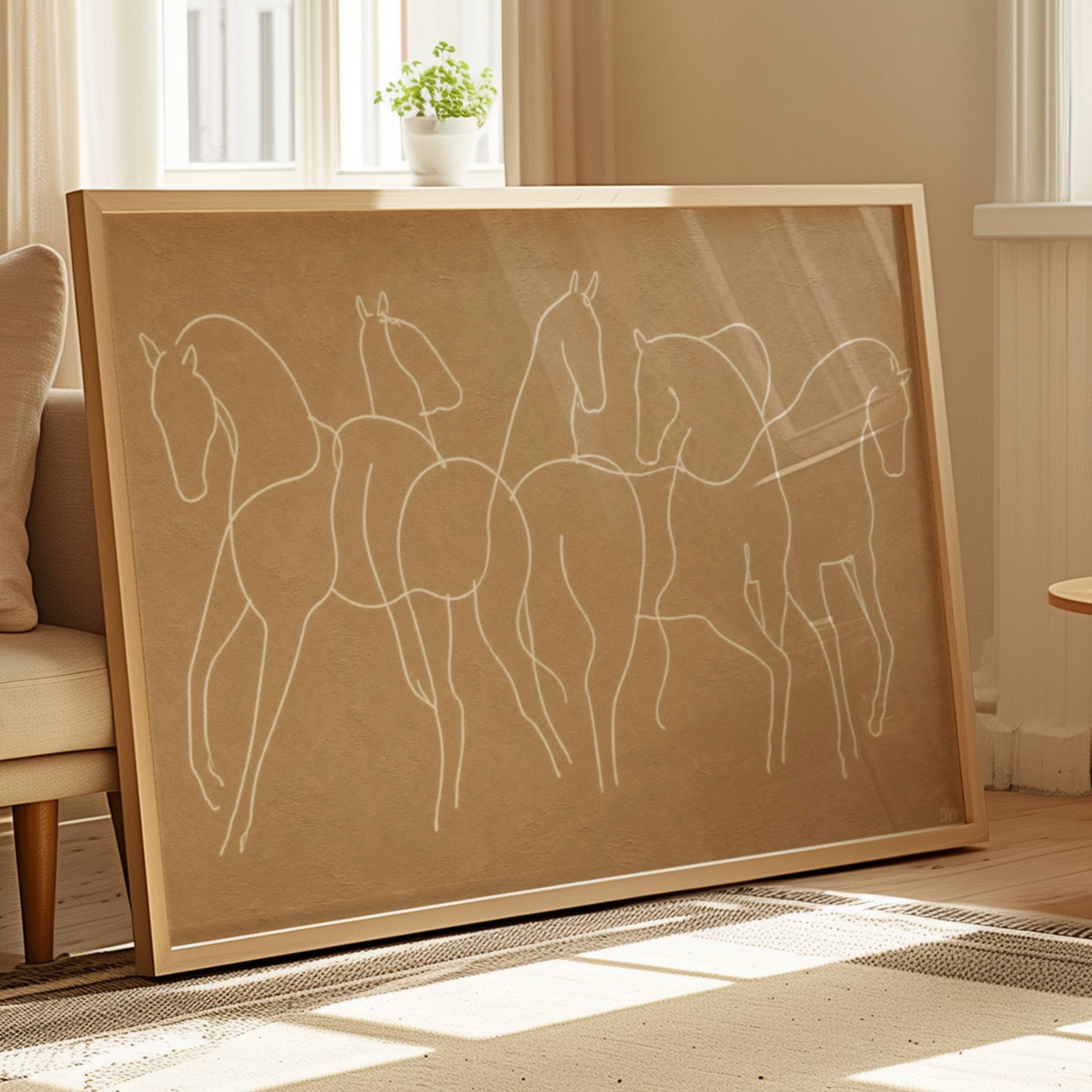 Wild hearts cant be broken is a hand drawn minimalist wall art print with abstract horse figures in a Line Drawing art, on a textured neutral background. Delicate continuous lines intertwine to create a herd in motion, capturing the feeling of untamed spirit and effortless elegance, contemporary and timeless, this piece evokes childhood obsessions, long summers and the beauty of horses.